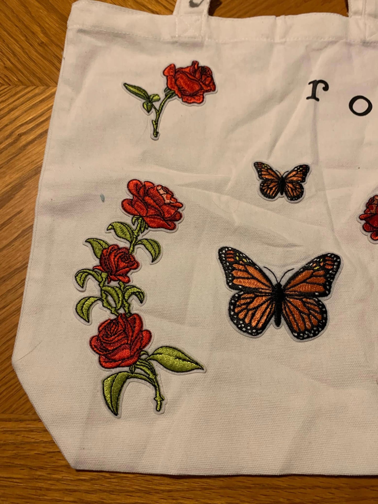 Rose and butterflies tote bag