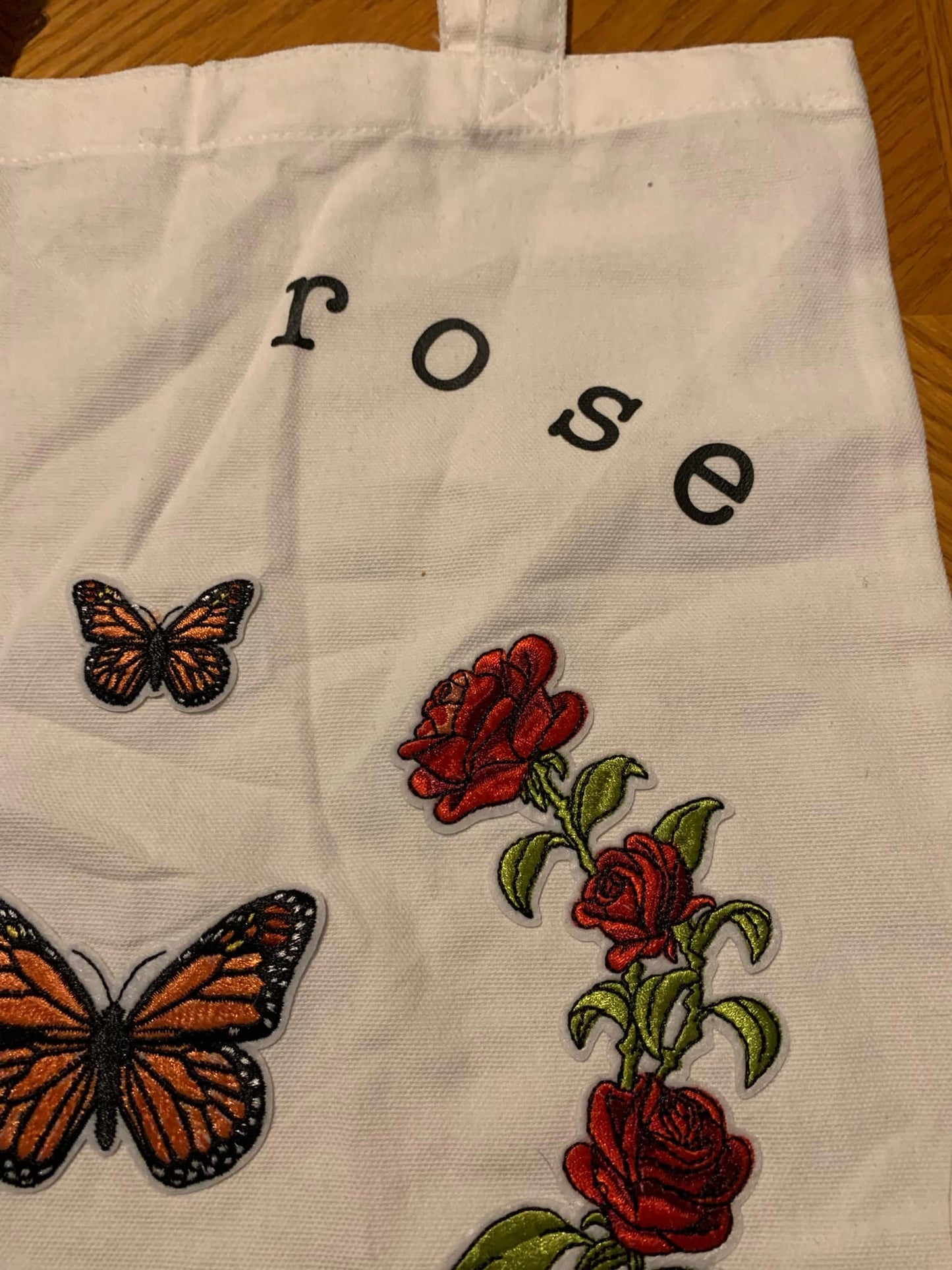 Rose and butterflies tote bag